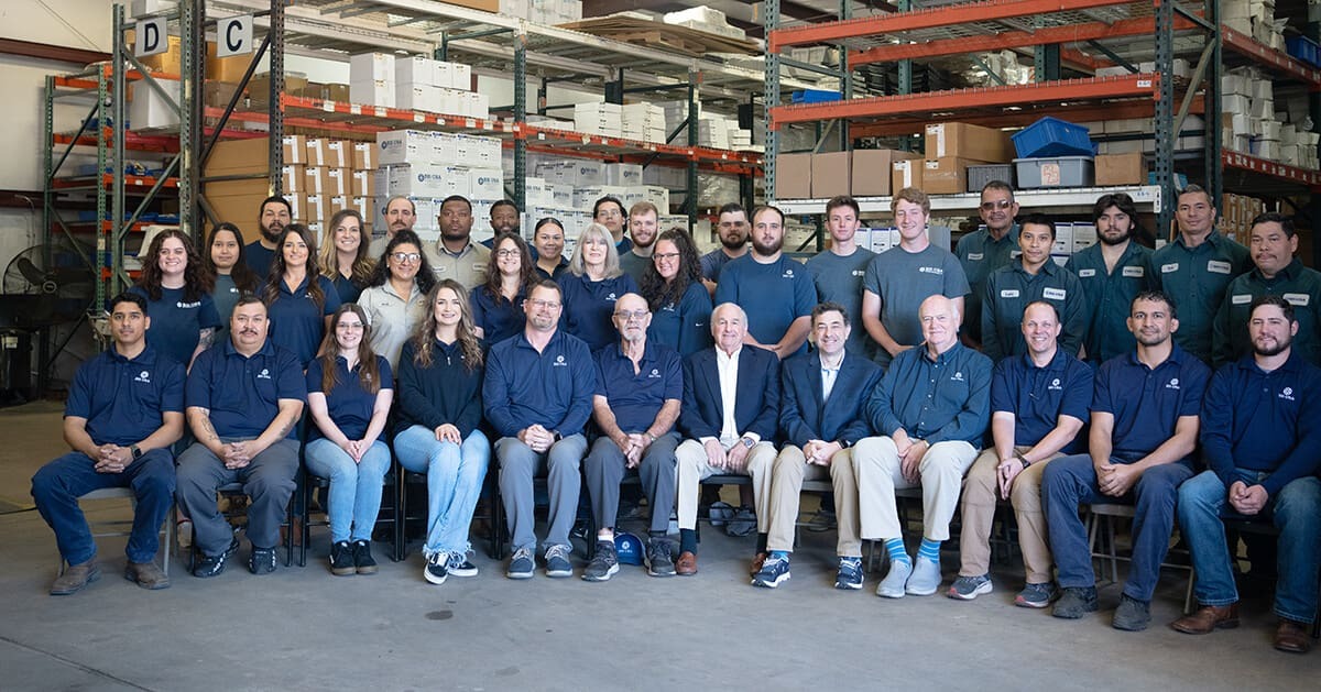 The BH-USA team standing together inside the Longview, Texas warehouse